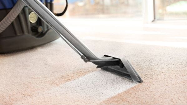 guy cleaning carpet