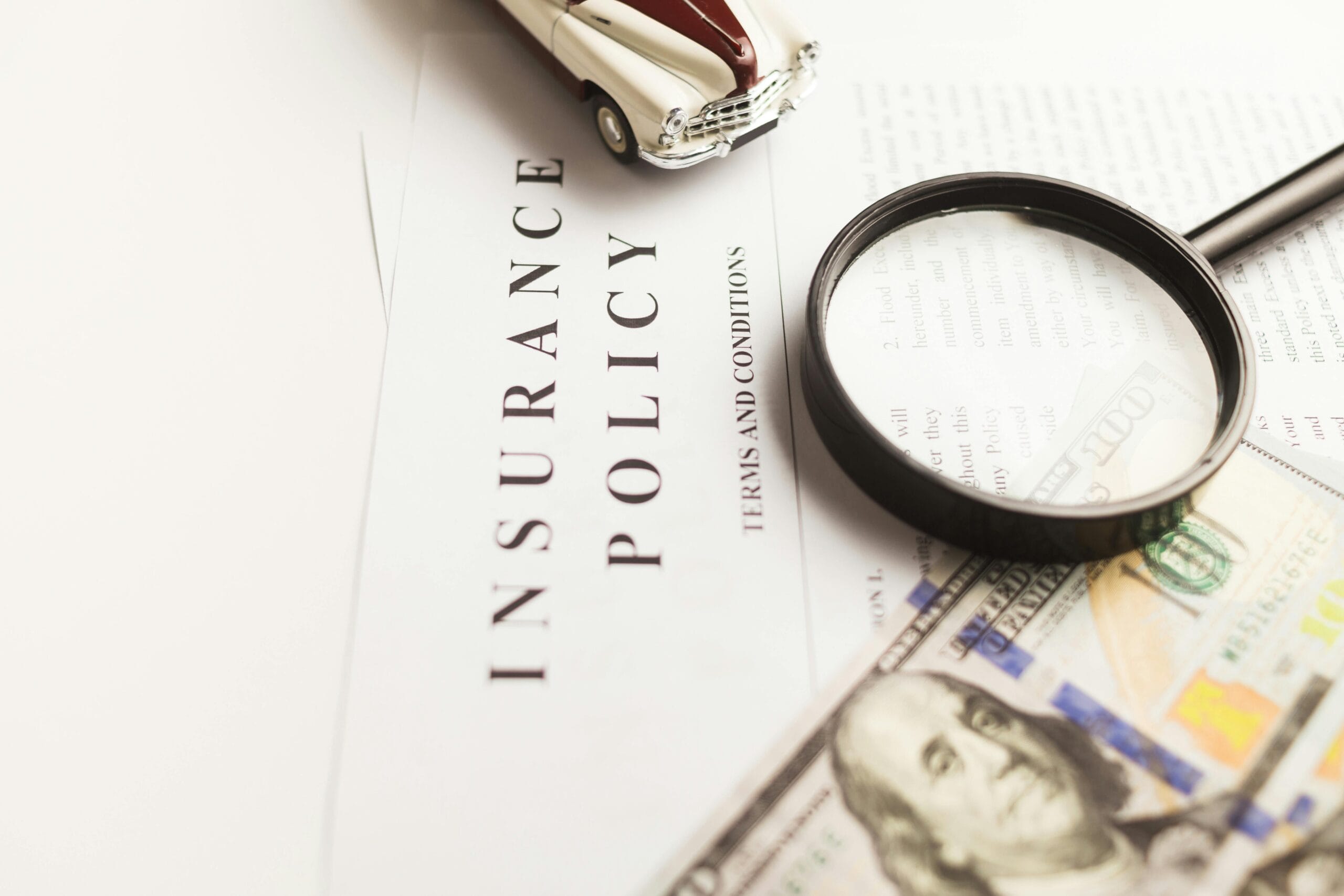 Magnifying glass on top of a document